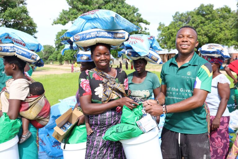 Nkotakota flood victms receiving the relief